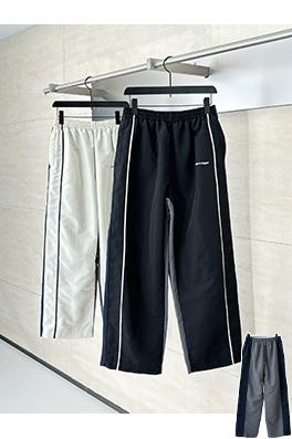 バレンシアガ Balenciag アルファベットロゴ刺繍対照色ステッチナイロンパンツ