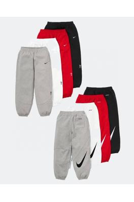 シュプリームコピー X NIKE ジョイントモデルのベルベットと厚の刺繍ロゴカフススポーツスウェットパンツ