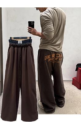 アクネストゥディオズ Acne Studios レザーアップリケ刺繍ダブルウエストバンドスウェットパンツ