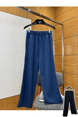 バレンシアガ サイドストライプ柄のワイドレッグカジュアルパンツ