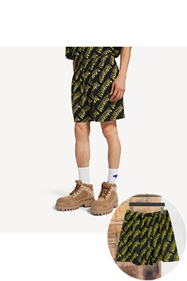 バレンシアガ Balenciaga 文字プリントのショートパンツ