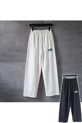バレンシアガ BALENCIAGA クラシックな英字ロゴ刺繍とインクが飛び散ったようなデザインのカジュアルスポーツパンツ