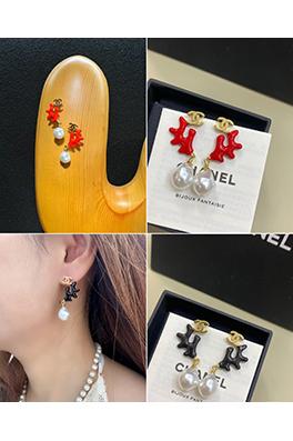 シャネルスーパーコピー レディース黒い樹脂製の木の枝を模したパールペンダントイヤリング