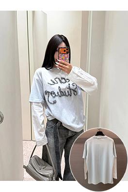 アクネストゥディオズ Acne Studios 袖にフロッキーの文字ツーピース風の長袖シャツ