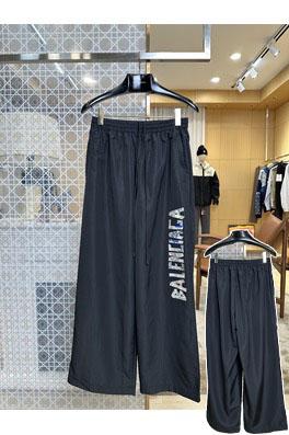 バレンシアガ ウエストゴム入りグラフィティ柄ワイドレッグのカジュアルパンツ