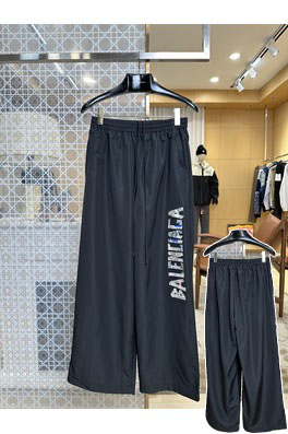 バレンシアガ ウエストゴム入りグラフィティ柄ワイドレッグのカジュアルパンツ