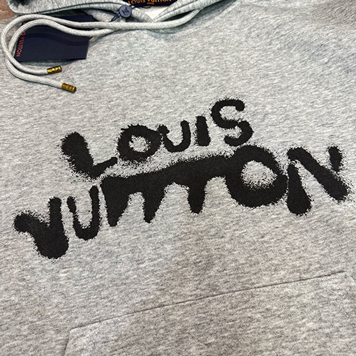 ルイヴィトンコピー インクスプラッシュ文字りのネオンポートレートパーカー