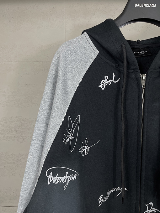 バレンシアガ ウォッシュダメージした手描きのグラフィティのフード付きジップアップスウェットシャツ