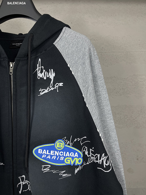 バレンシアガ ウォッシュダメージした手描きのグラフィティのフード付きジップアップスウェットシャツ