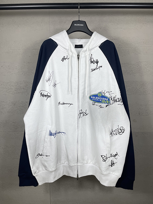 バレンシアガ ウォッシュダメージした手描きのグラフィティのフード付きジップアップスウェットシャツ
