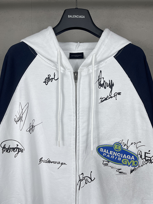 バレンシアガ ウォッシュダメージした手描きのグラフィティのフード付きジップアップスウェットシャツ