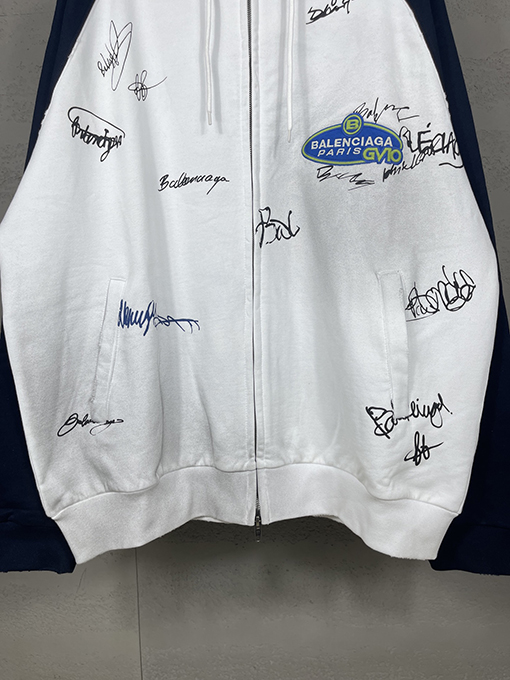 バレンシアガ ウォッシュダメージした手描きのグラフィティのフード付きジップアップスウェットシャツ