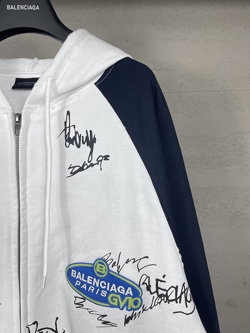 バレンシアガ ウォッシュダメージした手描きのグラフィティのフード付きジップアップスウェットシャツ