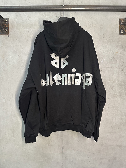 バレンシアガ テーププリントの長袖フード付きスウェットシャツ