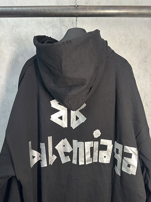 バレンシアガ テーププリントの長袖フード付きスウェットシャツ