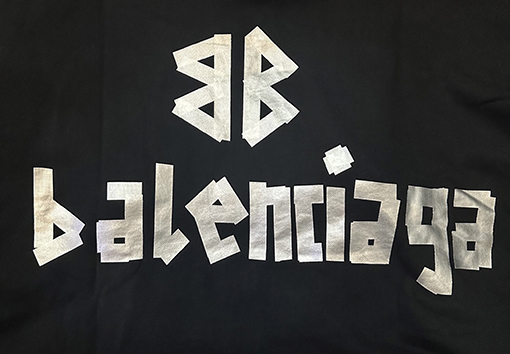 バレンシアガ テーププリントの長袖フード付きスウェットシャツ