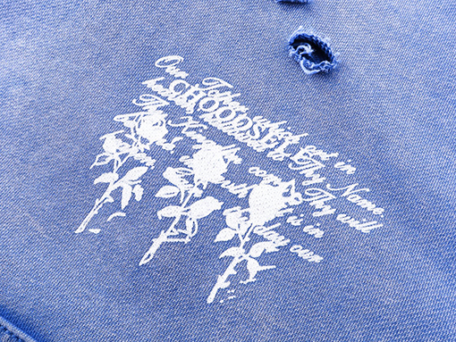 セントマイケル にキャラクターの頭を彩色の古したパーカー