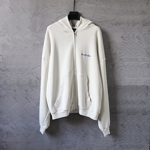 バレンシアガ Balenc1aga 英語の刺繍とダメージのジッパーがダメージのフード付きスウェットシャツ