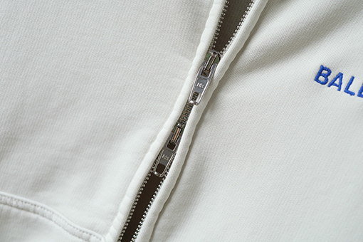 バレンシアガ Balenc1aga 英語の刺繍とダメージのジッパーがダメージのフード付きスウェットシャツ