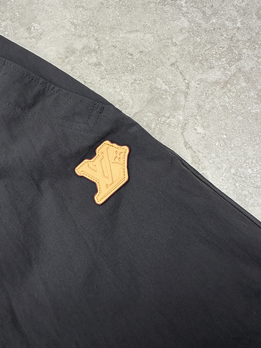 ルイヴィトン レザーロゴ織りカジュアルパンツ