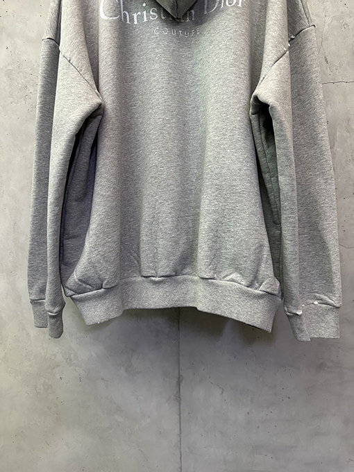 ディオール Christian Dior Couture 無地のロゴレタープリントのダメージパーカー