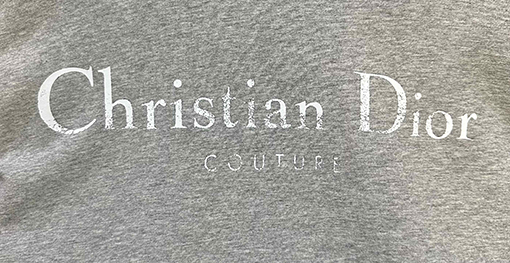 ディオール Christian Dior Couture 無地のロゴレタープリントのダメージパーカー