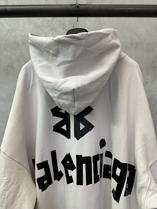 バレンシアガ Balenc1aga テーププリントのフード付きスウェットシャツ
