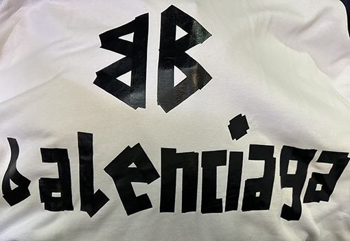 バレンシアガ Balenc1aga テーププリントのフード付きスウェットシャツ