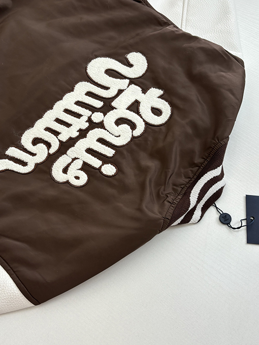 ルイヴィトン ブラウンのデイジー刺繍入りベースボールジャケット