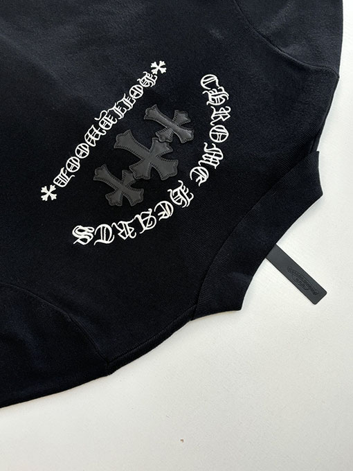 クロムハーツ ウールとレザーのパッチワークサンスクリット刺繍のニットカーディガン