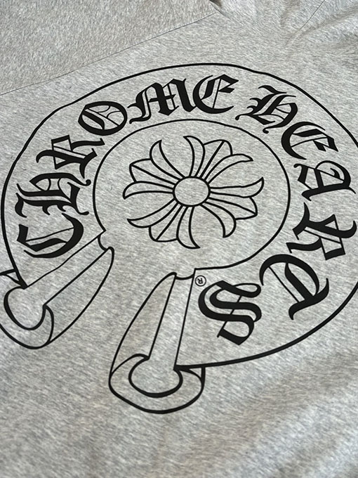 クロムハーツ ホースシュープリントのリバーシブルフード付きコットンコート