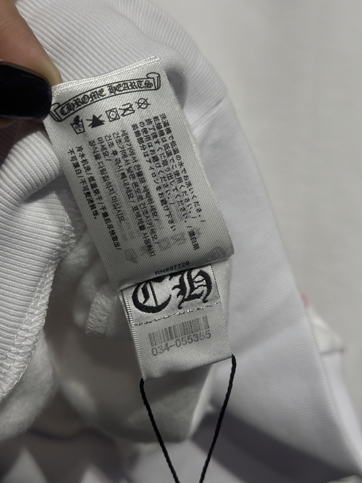 クロムハーツ Mattyboy 馬蹄形のユニコーンアームのピンクと白のフード付きスウェットシャツ