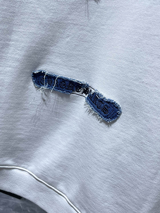 クロムハーツ クラシックな馬蹄形のカラーブロックアップリケ刺繍パーカー