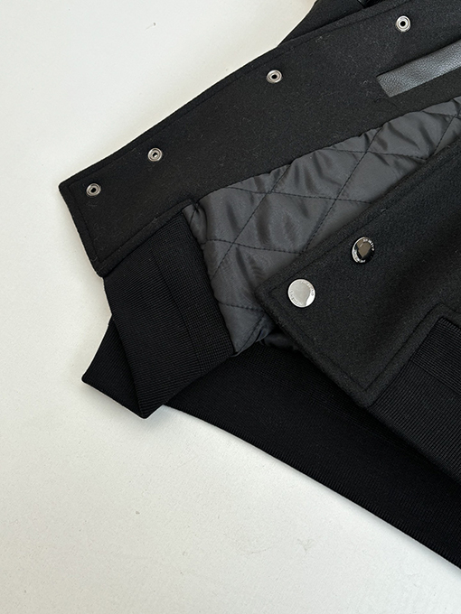 ジバンシイ Givenchy 無地のダークウールとレザーのスナップボタンベースボールジャケット