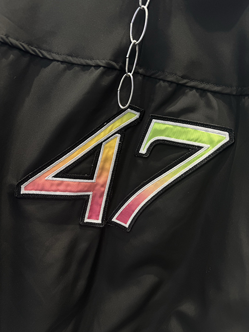 ディオール リブ編みのレタリングと刺繍パッチワークがされたブラックのベースボールスタイルのコットンジャケット