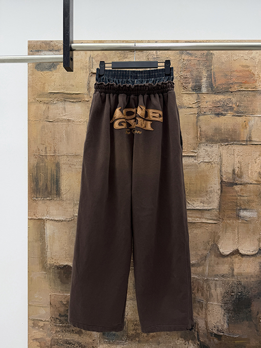 アクネストゥディオズ Acne Studios レザーアップリケ刺繍ダブルウエストバンドスウェットパンツ