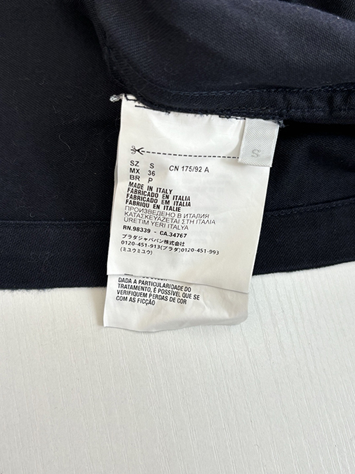 プラダ ワックスのトライアングルロゴラペルジャケット