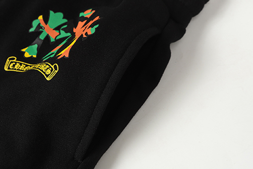 クロムハーツ サンスクリット文字プリントの白いカジュアルパンツ