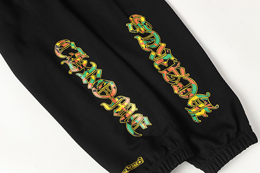 クロムハーツ サンスクリット文字プリントの白いカジュアルパンツ