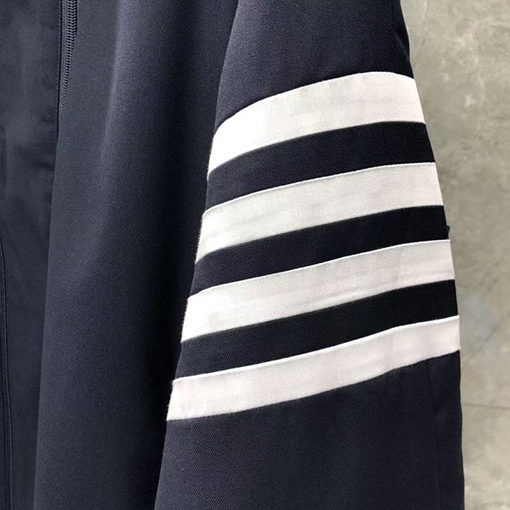 トムブラウン ホワイトの4ストライプダブルジップジャケット