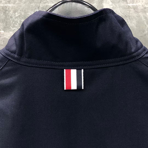 トムブラウン ホワイトの4ストライプダブルジップジャケット