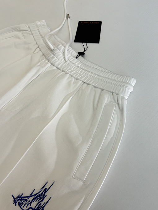 ルイヴィトンコピー 四つ葉のクローバーのスケッチが刺繍されたストレートレッグのカジュアルパンツ