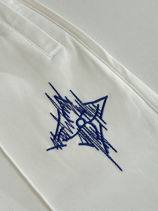 ルイヴィトンコピー 四つ葉のクローバーのスケッチが刺繍されたストレートレッグのカジュアルパンツ