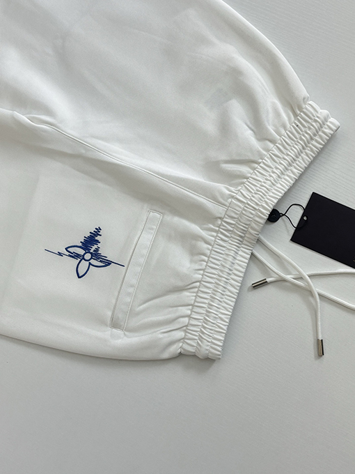 ルイヴィトンコピー 四つ葉のクローバーのスケッチが刺繍されたストレートレッグのカジュアルパンツ