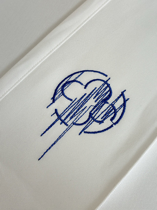 ルイヴィトンコピー 四つ葉のクローバーのスケッチが刺繍されたストレートレッグのカジュアルパンツ