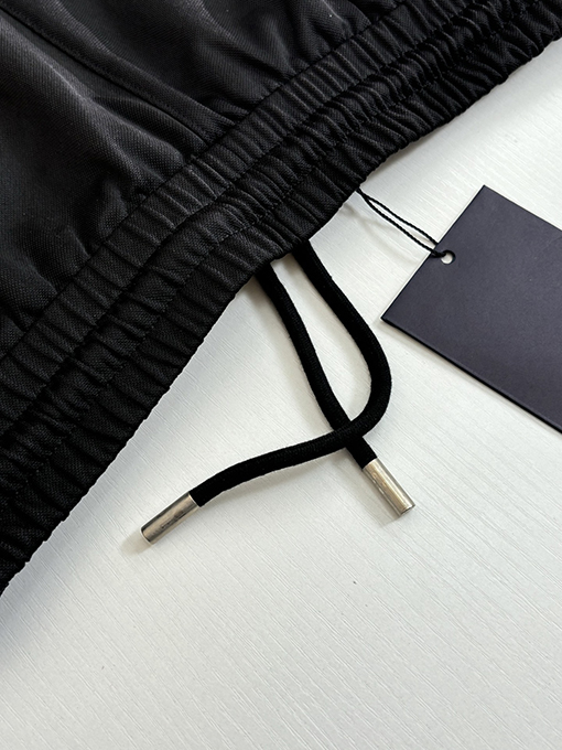 ルイヴィトンコピー 四つ葉のクローバーのスケッチが刺繍されたストレートレッグのカジュアルパンツ