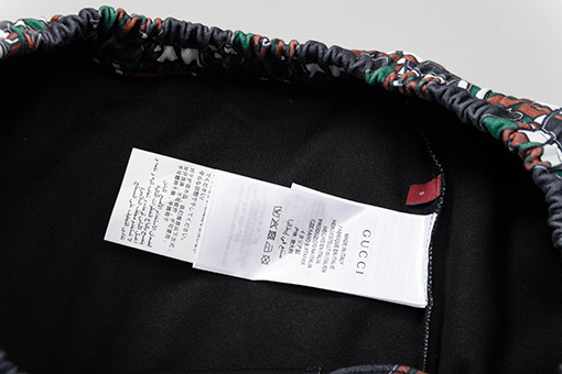 グッチ 全面ロゴプリントのカジュアルショートパンツ