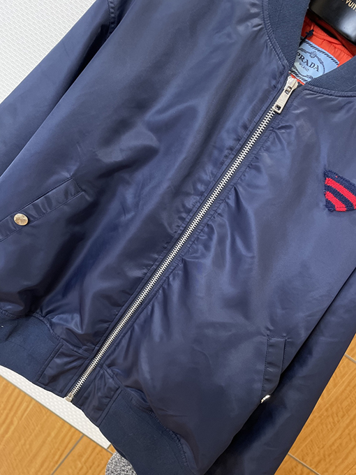 プラダ ニットトライアングルロゴスタンドカラーコットンジャケット