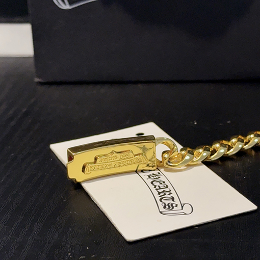 クロムハーツコピー 金色の十字型ダイヤモンド剣ブレスレット