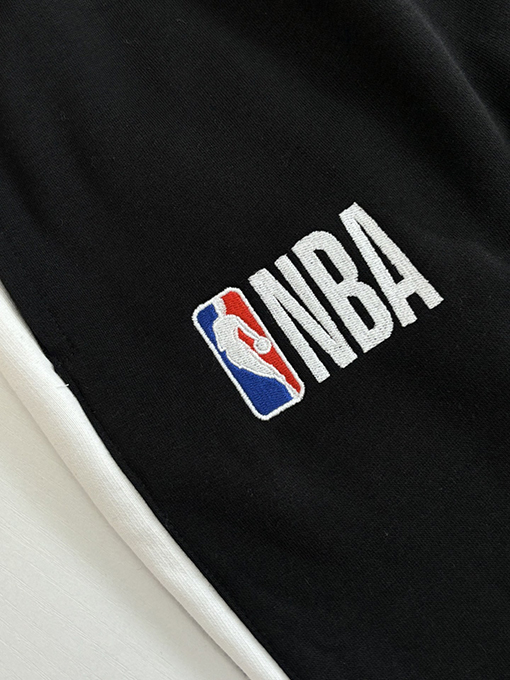 バレンシアガ NBAとの共同ブランド円形刺繍入りストレートレッグカジュアルパンツ